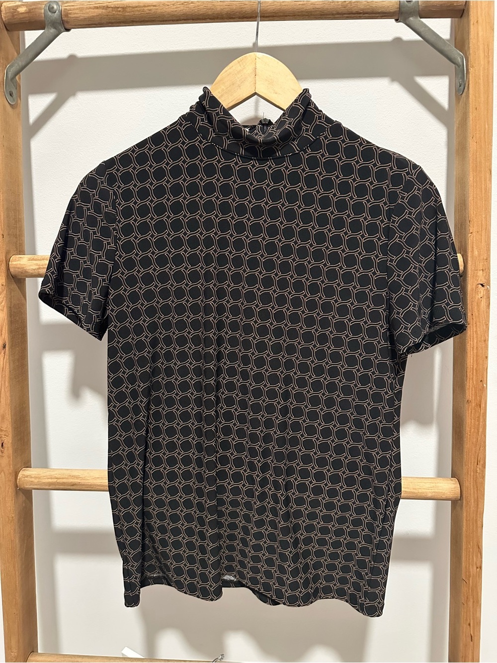 Women’s Short Sleeve Mock Neck Shirt in Black with Brown Geometric Print
